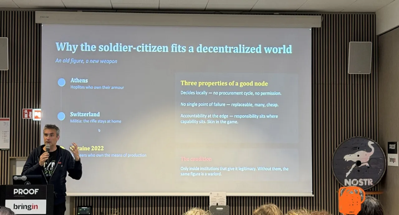 Alexis Roussel on stage during his talk on the soldier-citizen